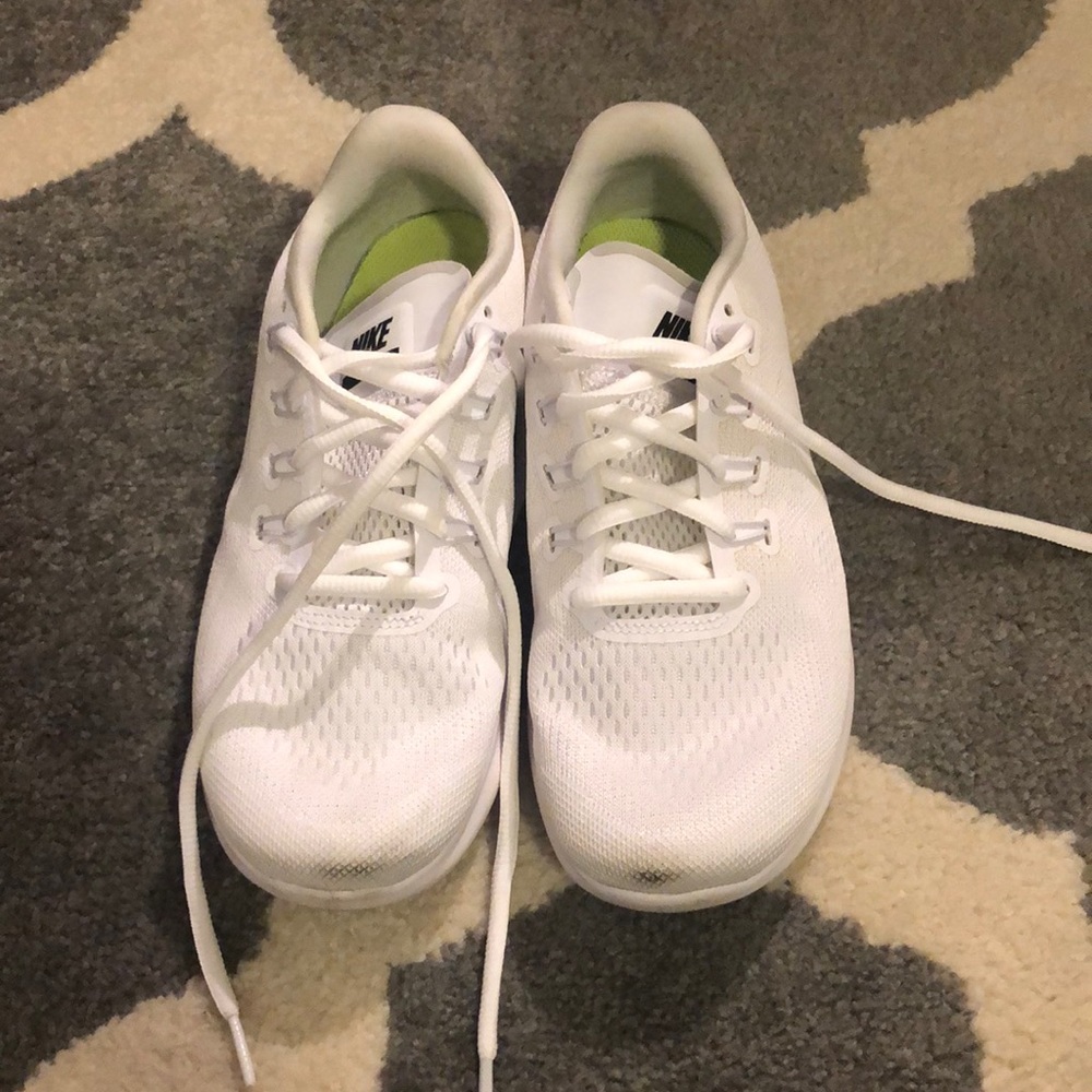 White nike free runs.